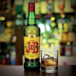 image of J&B Whiskey and a glass of Whiskey,