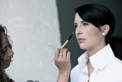 Hanna Cates having the final make up done on studio Portrait session