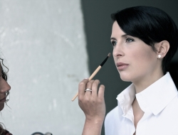 Hanna Cates having the final make up done on studio Portrait session