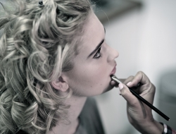 applying make up on a Commercial Portrait studio photography