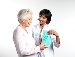 Lloyd Pharmacist delivering prescription