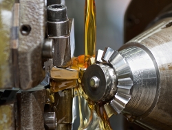 Machine detail with pouring oil-Industrial photo
