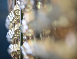 Industrial Photograph detail of metal products on dipping hangers