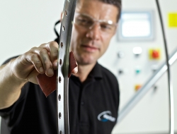 final preparation of precision aerospace component-industrial photographer