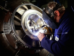 Arch welding on precision aerospace part-Industrial photographs