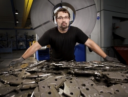 worker with components at Wild engineering Germany by ross vincent_industrial photography