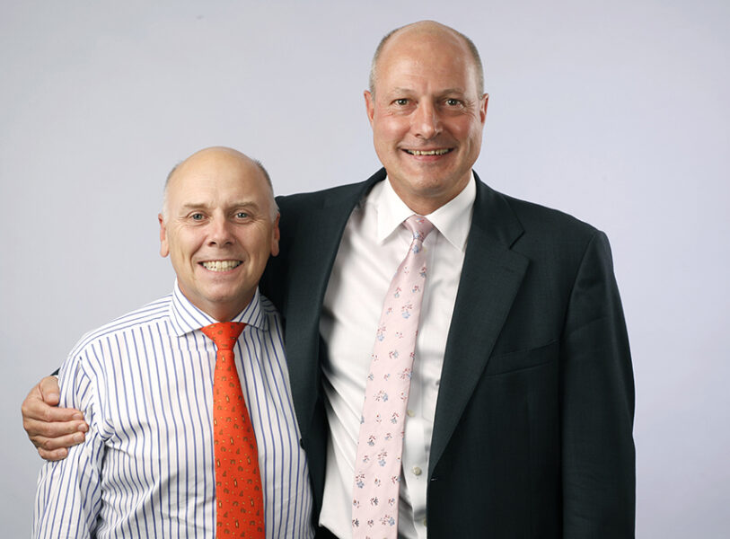 corporate portraits for Mercia Fund Management joking about with arms around each other