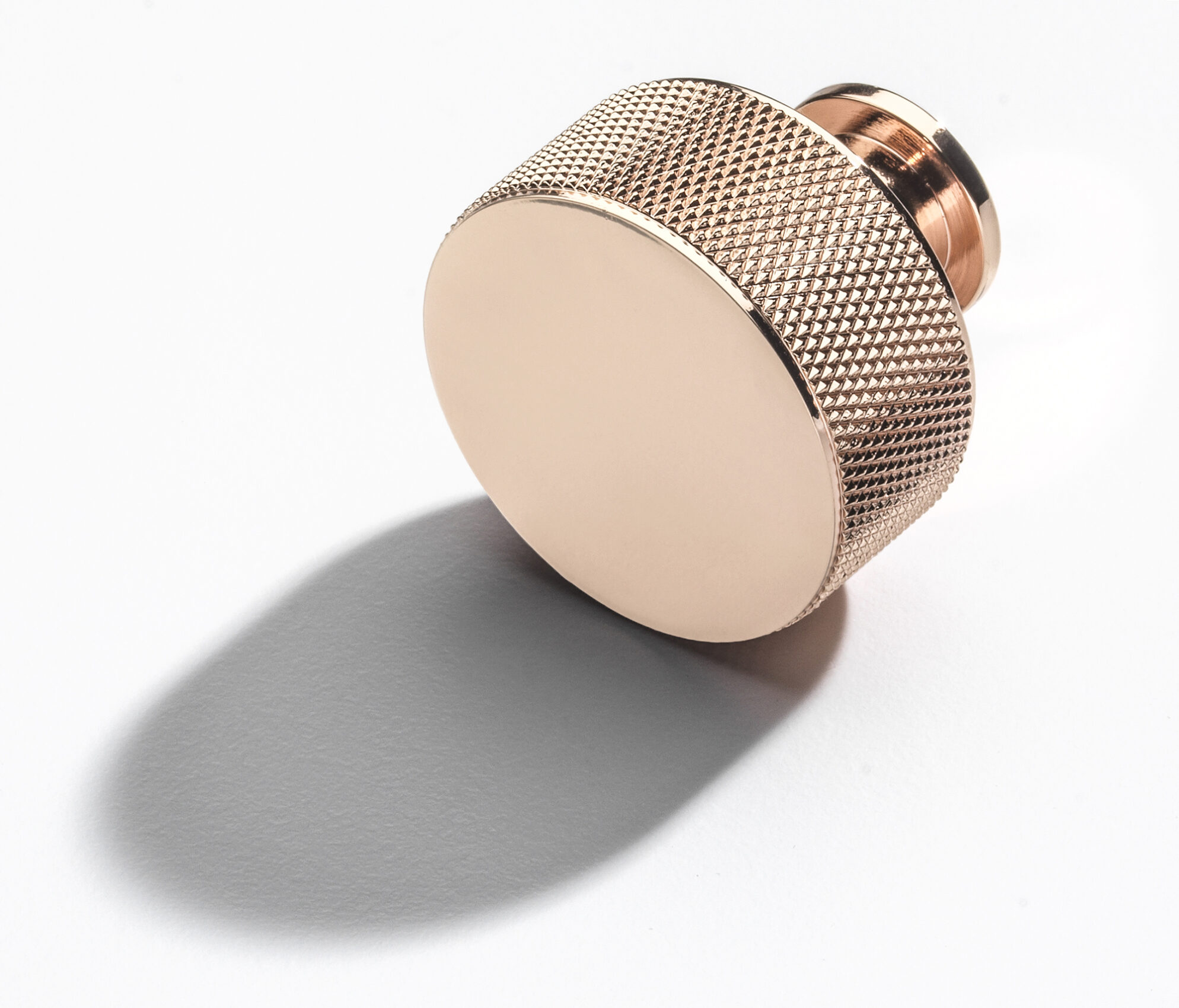 A Rose gold beautiful cabinet handle by Croft and Assinder showing detail and craftsmanship with fantastic colouring