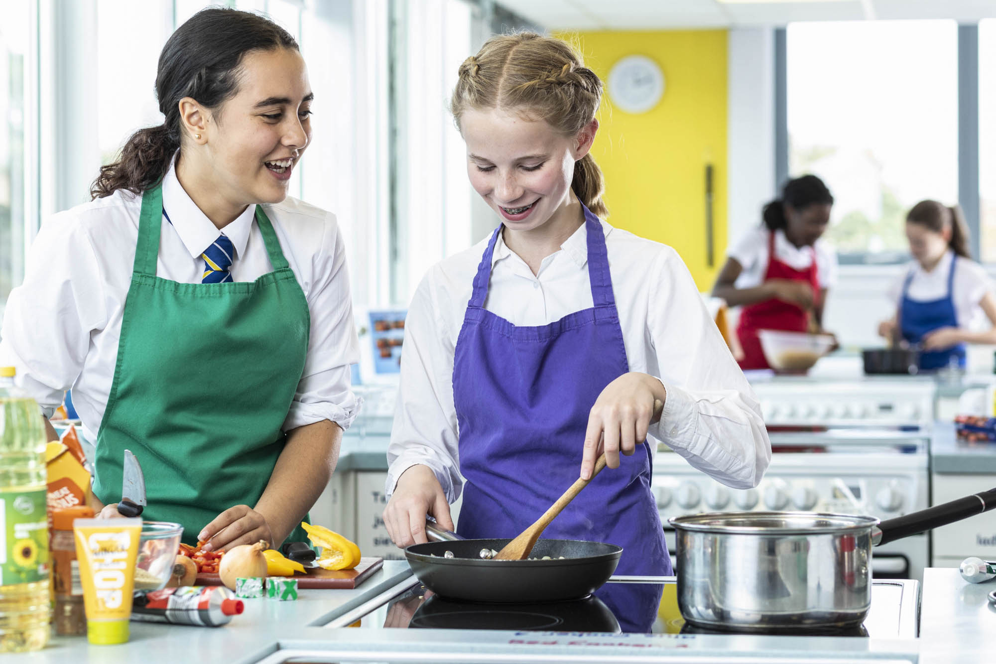 students preparing food at King Edwards Lordswood during home economics class