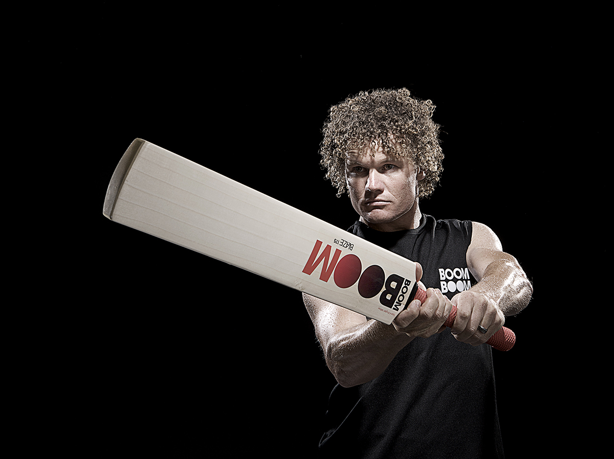 dramatic image of a Cricketer against a black studio background